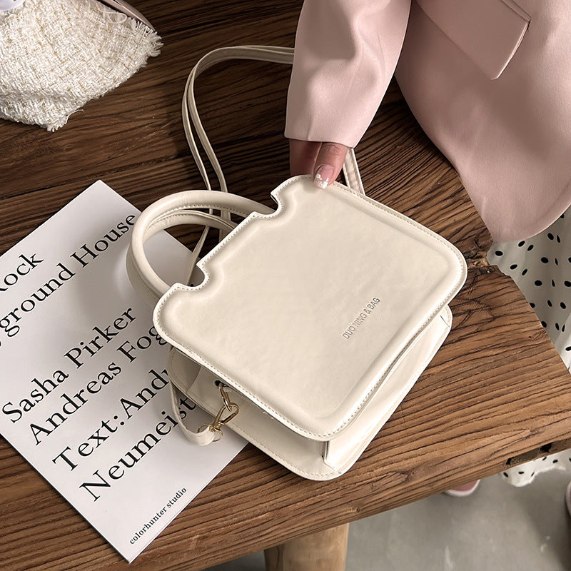 Super Hot Small Bag Women's Bag New High Quality Solid Color Portable Small Square Bag Fashion Texture Single Shoulder Messenger Bag