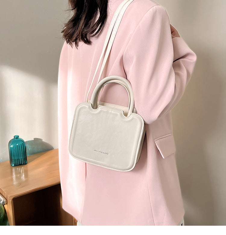 Super Hot Small Bag Women's Bag New High Quality Solid Color Portable Small Square Bag Fashion Texture Single Shoulder Messenger Bag
