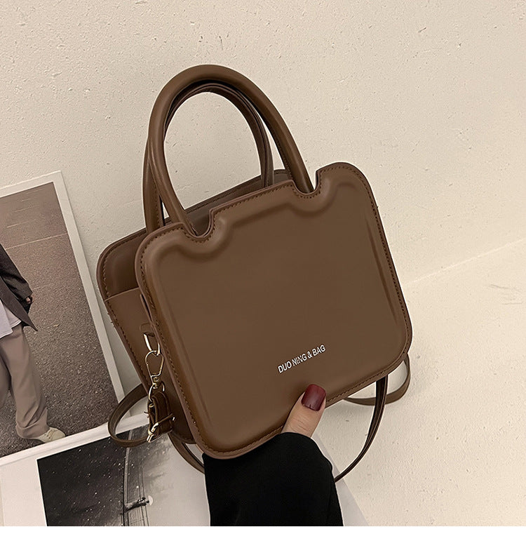 Super Hot Small Bag Women's Bag New High Quality Solid Color Portable Small Square Bag Fashion Texture Single Shoulder Messenger Bag