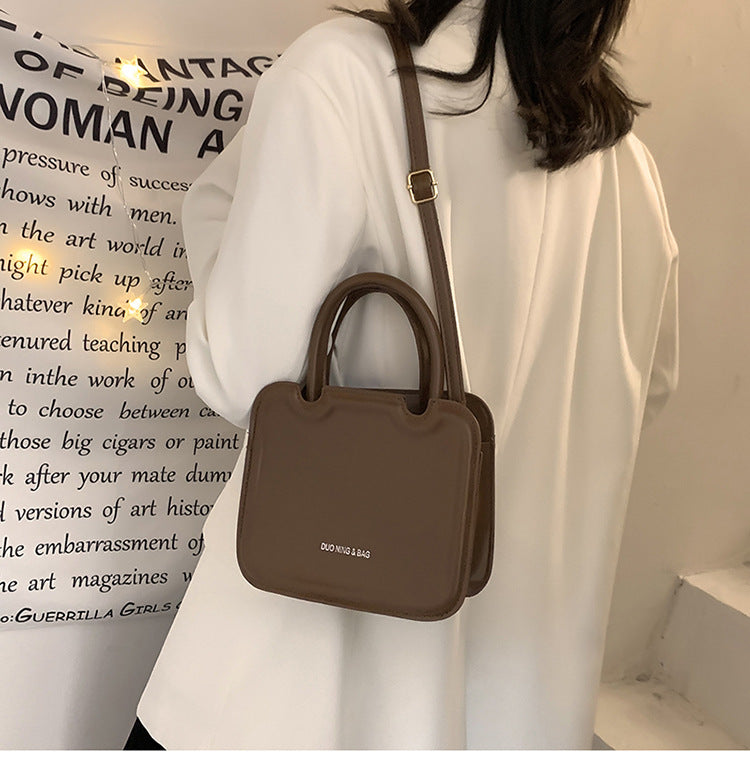 Super Hot Small Bag Women's Bag New High Quality Solid Color Portable Small Square Bag Fashion Texture Single Shoulder Messenger Bag