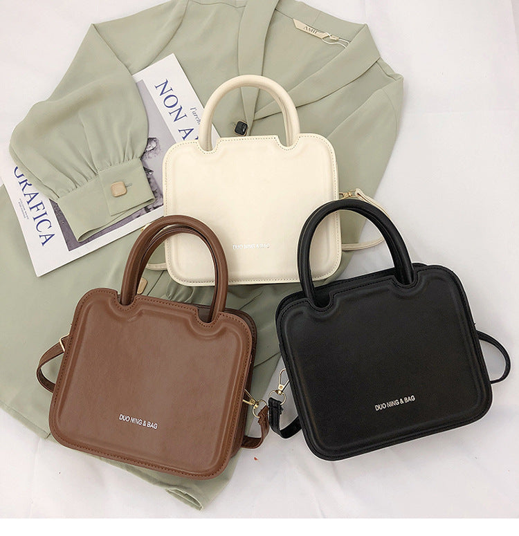 Super Hot Small Bag Women's Bag New High Quality Solid Color Portable Small Square Bag Fashion Texture Single Shoulder Messenger Bag